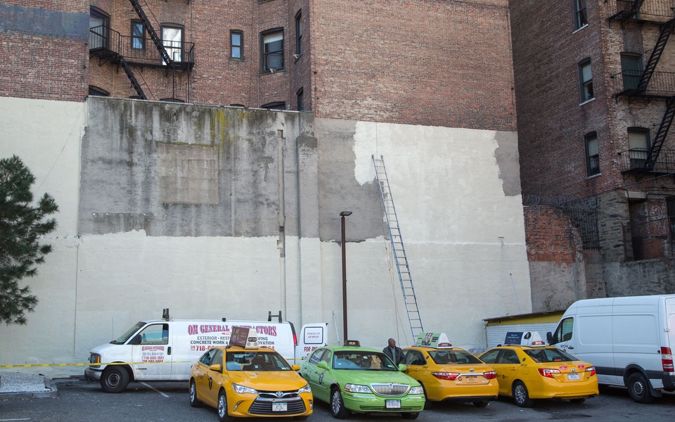 Mike Hewson: (Unannounced removal of sign and painting of wall) - McDonald's Parking Lot, 125th St and Broadway, Harlem